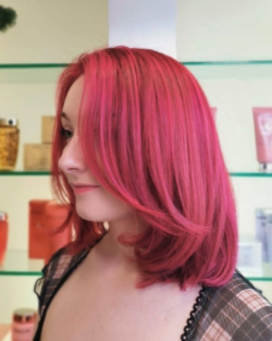 Red thick hair in a long angled lob by Rush.