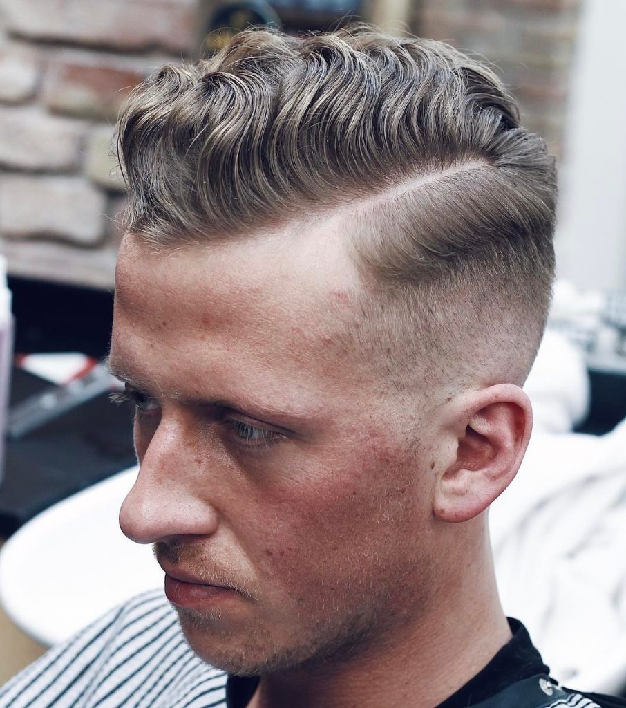 Side part hairstyle comb over with mid fade