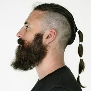 shaved side mens ponytail hairstyle