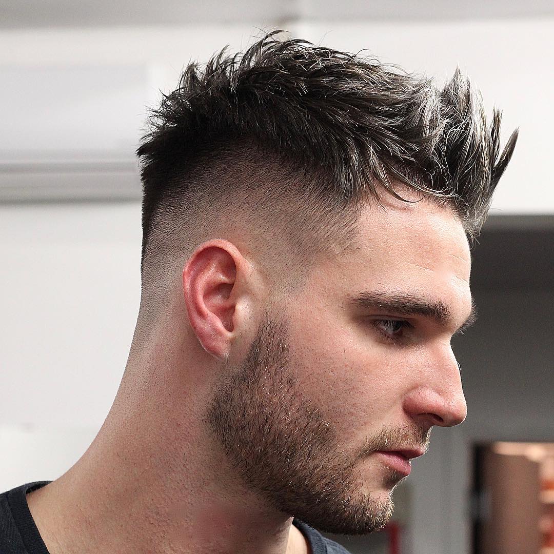 Short spiky quiff haircut for men with skin fade and beard