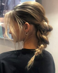 A plaited ponytail Christmas party hairdo styled by Rush.