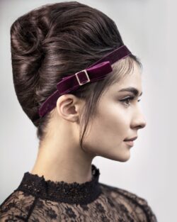 Dark hair in a beehive updo style.